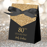 80th Birthday Black Gold Glitter Thank You Favor Box<br><div class="desc">This fabulous modern 80th Birthday Black Gold Glitter Thank You favour box with sparkling gold glitter, the birthday girl's name in a trendy script font, and tied with an elegant black bow would be perfect for your event. It would be great for a candy station, on a thank you gift...</div>
