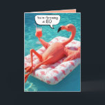 80th Birthday Flamingo Floating In a Pool Card<br><div class="desc">A flamingo relaxes on a float in a swimming pool,  holding a pink cocktail with its wing for an 80th birthday.
The inside text can be changed.</div>