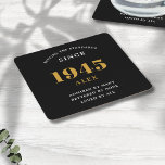 80th Birthday Name 1945 Black Gold Elegant Chic Square Paper Coaster<br><div class="desc">Premium 80th Birthday Black and Gold Personalized Paper Coasters - Celebration Elegance. Celebrate a milestone birthday in style with our chic, premium-quality, 80th Birthday paper coasters. Exquisitely designed with a striking black and gold colour scheme, these coasters add a touch of luxury and sophistication to any 80th birthday bash. Express...</div>
