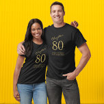 80th Birthday Party Black And Gold T-Shirt<br><div class="desc">Celebrate a special 80th birthday with this black t-shirt featuring gold script. Show your love and appreciation for the birthday boy or girl with this eye-catching t-shirt that can be easily personalized. Make this 80th birthday celebration even more special with this stylish and modern t-shirt that will be sure to...</div>