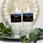80th Birthday Party Navy Blue Gold Agate Water Bottle Label<br><div class="desc">These chic 80th birthday water bottle labels feature a watercolor image of an agate geode in shades of navy blue with faux gold glitter highlights. The words "80th Birthday" appear in faux gold glitter in a decorative modern handwriting font. Customize it with the name of the guest of honour and...</div>