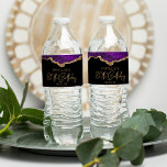 80th Birthday Party Purple Gold Agate Water Bottle Label<br><div class="desc">These chic 80th birthday water bottle labels feature a watercolor image of an agate geode in shades of purple with faux gold glitter highlights. The words "80th Birthday" appear in faux gold glitter in a decorative modern handwriting font. Customize it with the name of the guest of honour and the...</div>