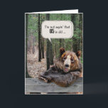 85th Birthday Bear In a Forest Card<br><div class="desc">A bear humorously poses with its paws resting on a wooden picnic table in a forest setting for a 85th birthday.</div>