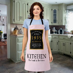 90th Birthday 1935 Name Elegant Black Gold Pink Apron<br><div class="desc">A wonderful birthday black and gold design on an apron for that special celebration. Easily customize the text using the template provided. Part of the setting standards range of birthday supplies.</div>