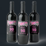 90th birthday black pink floral wine label<br><div class="desc">Elegant design for a 90th birthday party with a pink "90 & fabulous" and a scripted name,  embellished by a feminine floral design on a black background. Customize name,  age,  text and background colour.</div>