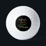 90th Birthday Cheers Beers Golf Party Golf Balls<br><div class="desc">This is a stylish 90th birthday design with a golf cheers and beers theme. It is a modern design, in classic black and white with orange, green and gold typography. Perfect for a fun, golf and beer themed, 90th birthday party and ideal as a birthday gift, party accessories or party...</div>