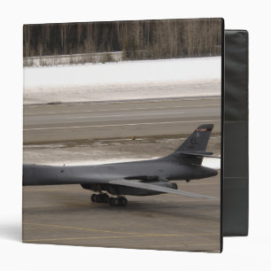 A B-1B Lancer performs a touch and go Binder