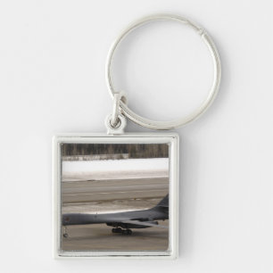 A B-1B Lancer performs a touch and go Keychain