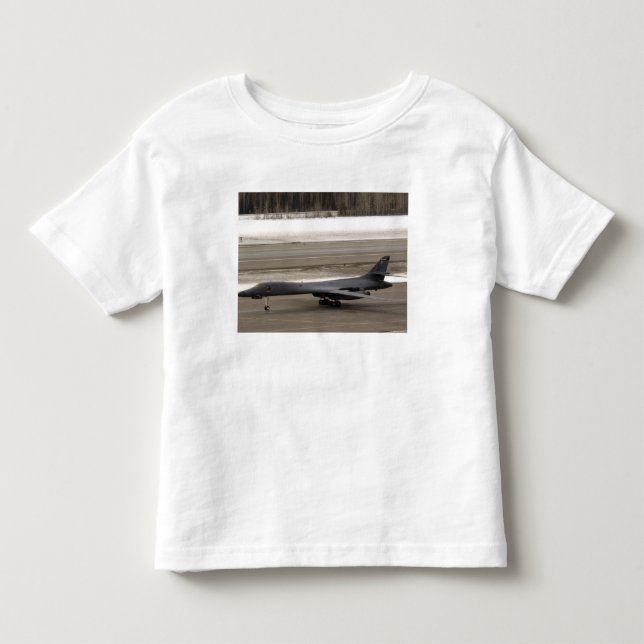 A B-1B Lancer performs a touch and go Toddler T-shirt (Front)
