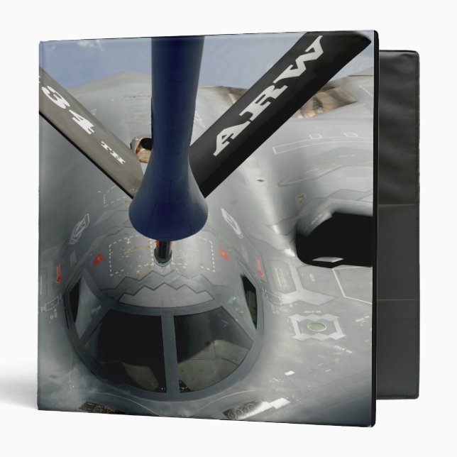 A B-2 Spirit aircraft getting in position Binder (Front/Inside)
