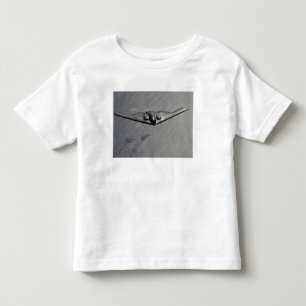 A B-2 Spirit flies over the Pacific Ocean Toddler T-shirt