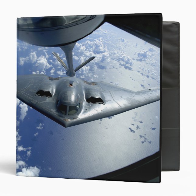 A B-2 Spirit moves into position for refueling Binder (Front/Inside)