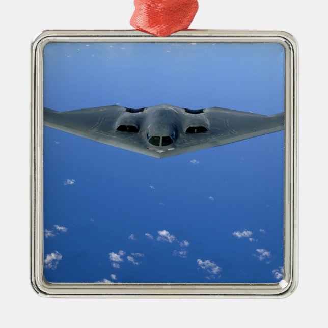 A B-2 Spirit soars through the sky Metal Ornament (Front)