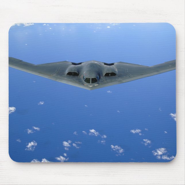 A B-2 Spirit soars through the sky Mouse Pad (Front)