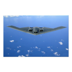 A B-2 Spirit soars through the sky Photo Print