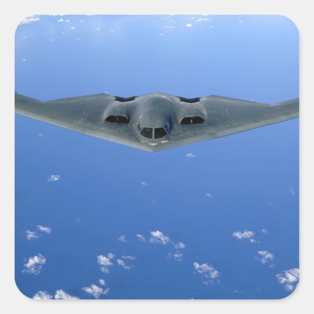 A B-2 Spirit soars through the sky Square Sticker (Front)
