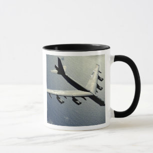 A B-52 Stratofortress in flight Mug