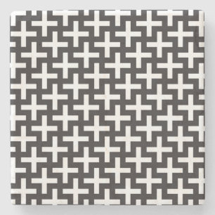 A b&w patterns made with 'plus' sign stone coaster