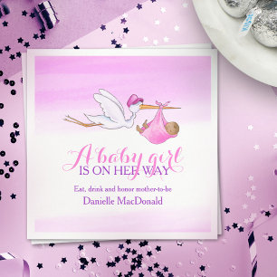 A baby girl is on her way stork pink napkins