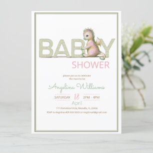 A baby shower invitation  with an adorable dragon.