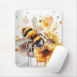A bee collects honey on a flower. mouse pad