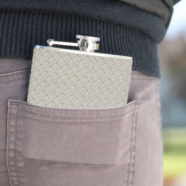 a beige background with a pattern of small squares hip flask (In Situ)