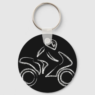 A biker on a motorbike keychain