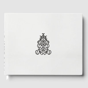 a black and white image of an ornate design guest book