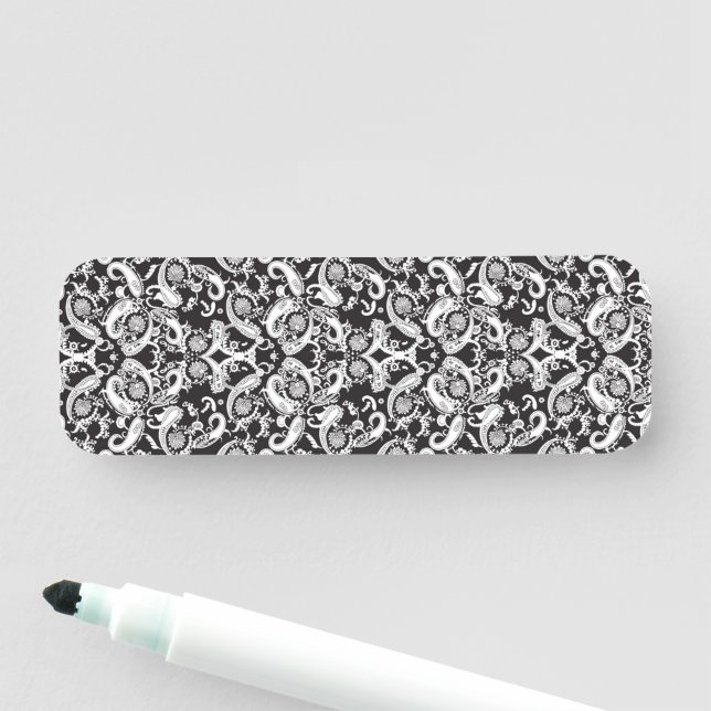 a black and white paisley pattern name tag (In Situ)