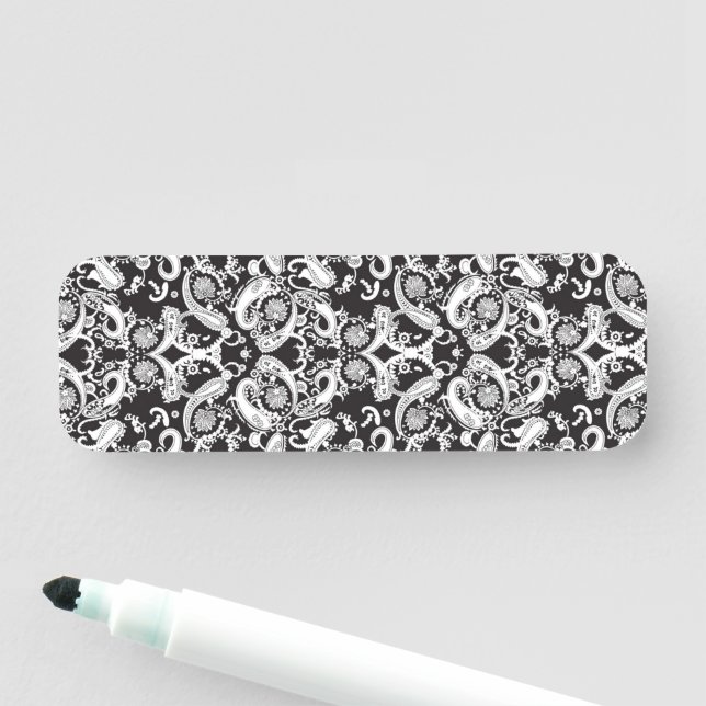 a black and white paisley pattern name tag (In Situ)