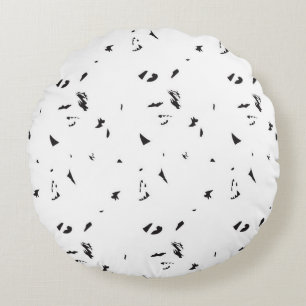 a black and white photo of a flock of birds round pillow
