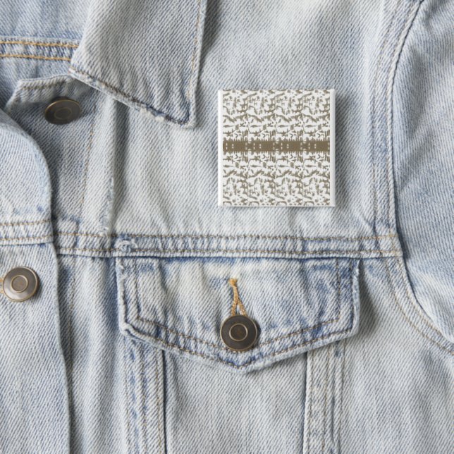 a black and white photo of a pattern 2 inch square button (In Situ)