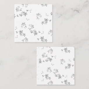 a black and white photo of snow flakes appointment card