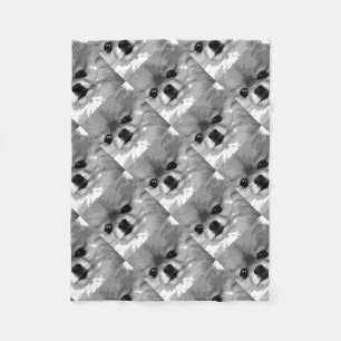 A black and white Pomeranian Fleece Blanket