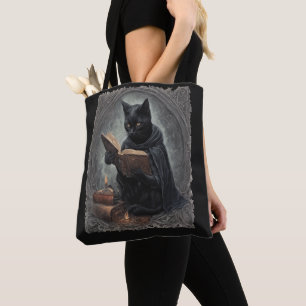 A Black Cat Wearing A Cloak Studying Halloween Tote Bag