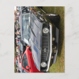 A black Series 1 Chevrolet Camaro Postcard