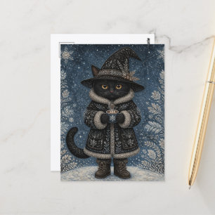 A Black Witch Cat in the Snow With Hot Cocoa Postcard