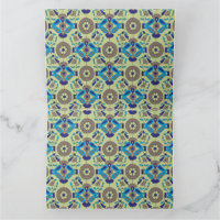 a blue and green pattern on a green background