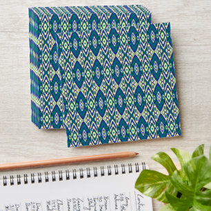 a blue and green pattern with a white background envelope