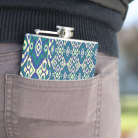 a blue and green pattern with a white background