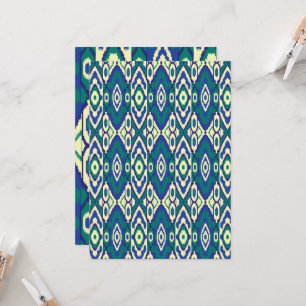 a blue and green pattern with a white background invitation