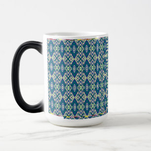 a blue and green pattern with a white background magic mug