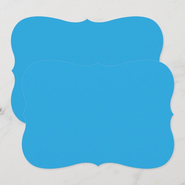 a blue background with a black and white cat card (Front/Back)