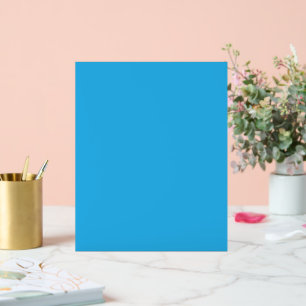 a blue background with a black and white cat on to acrylic sign