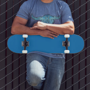 a blue background with a black and white clock skateboard