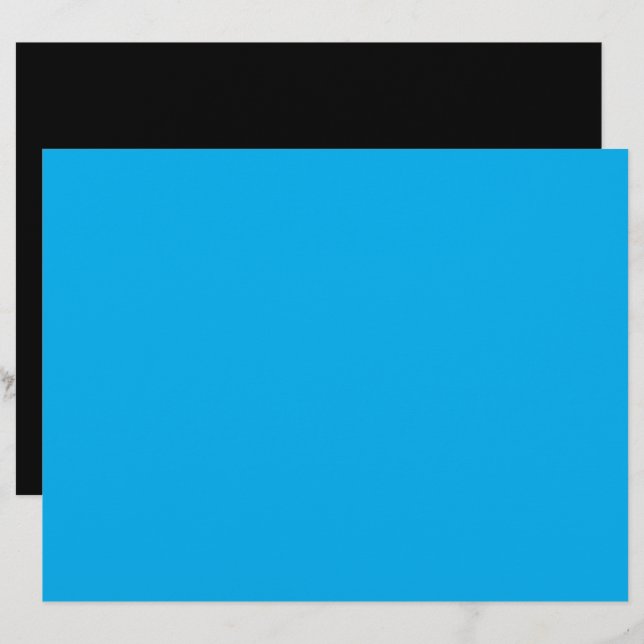 a blue sky with a plane flying in the sky letterhead (Front/Back)