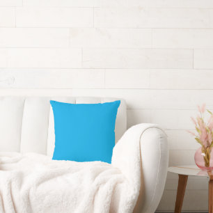 a blue sky with a plane  throw pillow