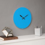 A blue square centred on a white background, crea large clock<br><div class="desc">This minimalist and sleek design features a blue square beautifully centred on a crisp white background,  enhancing the visual impact of the contrasting colours. Perfect for adding a modern touch to any space.</div>
