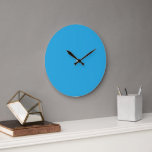 A blue square framed by a white border, presenting large clock<br><div class="desc">This elegant blue square,  delicately framed by a crisp white border,  exudes a contemporary and sophisticated aesthetic. Perfect for adding a touch of modern style to any space,  this piece is sure to elevate your decor with its clean and sleek design.</div>