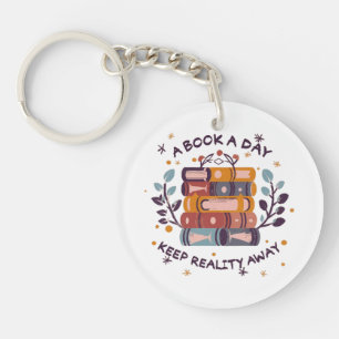 A book a day keep reality away keychain